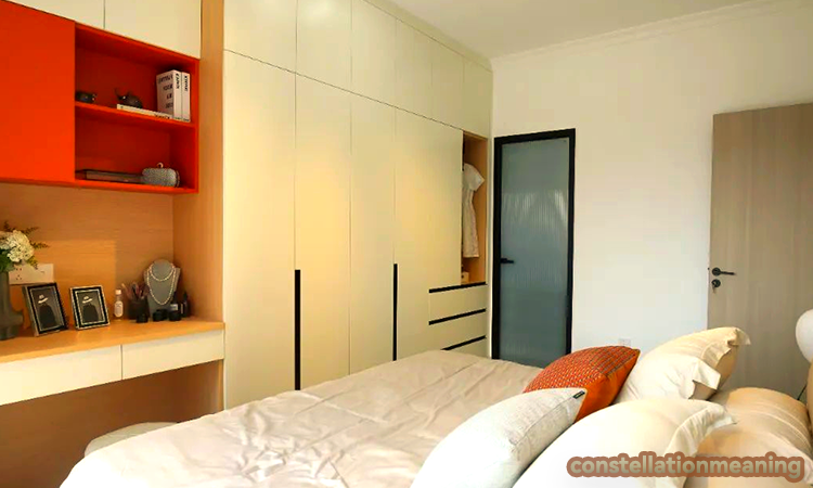 bed facing bathroom door